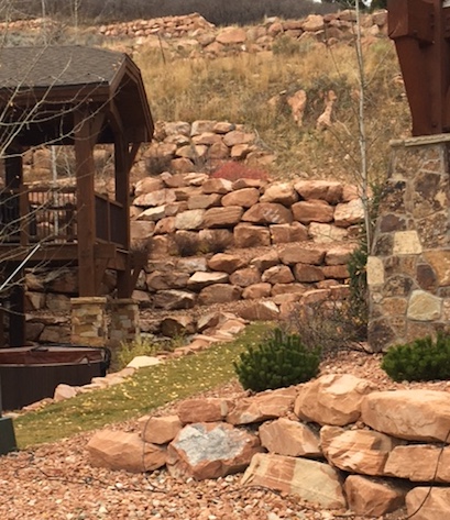 rockscape boulder retaining walls for flower bed and terraced hillside