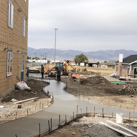 apartment-building-sidewalk-concrete-pour